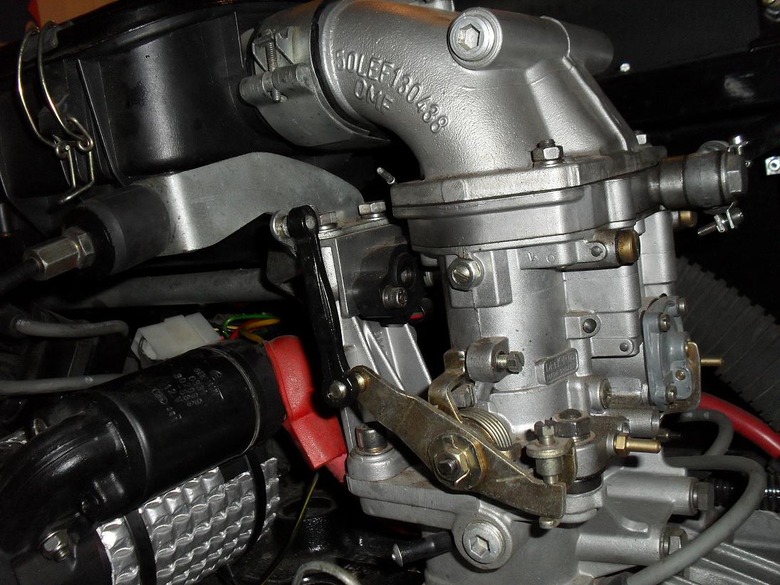 TPS mounted to end of throttle linkage.