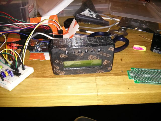 LEDs and LCD inside the enclosure.